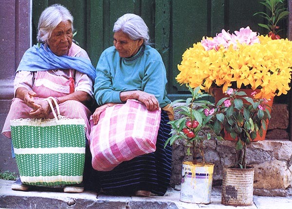 "Two flower vendors". Photographer: Ned Brown